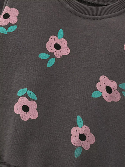 Children's Floral Print Crew Neck Sweatshirt with pink flowers and green leaves on a dark background.