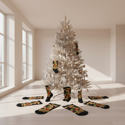 Black socks with a graphic of a Santa-like figure