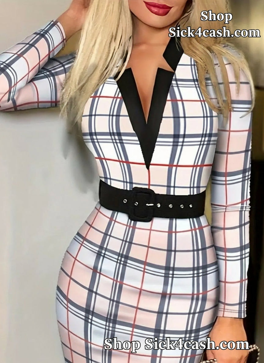 Plaid dress with a belt worn by a person, against a neutral background