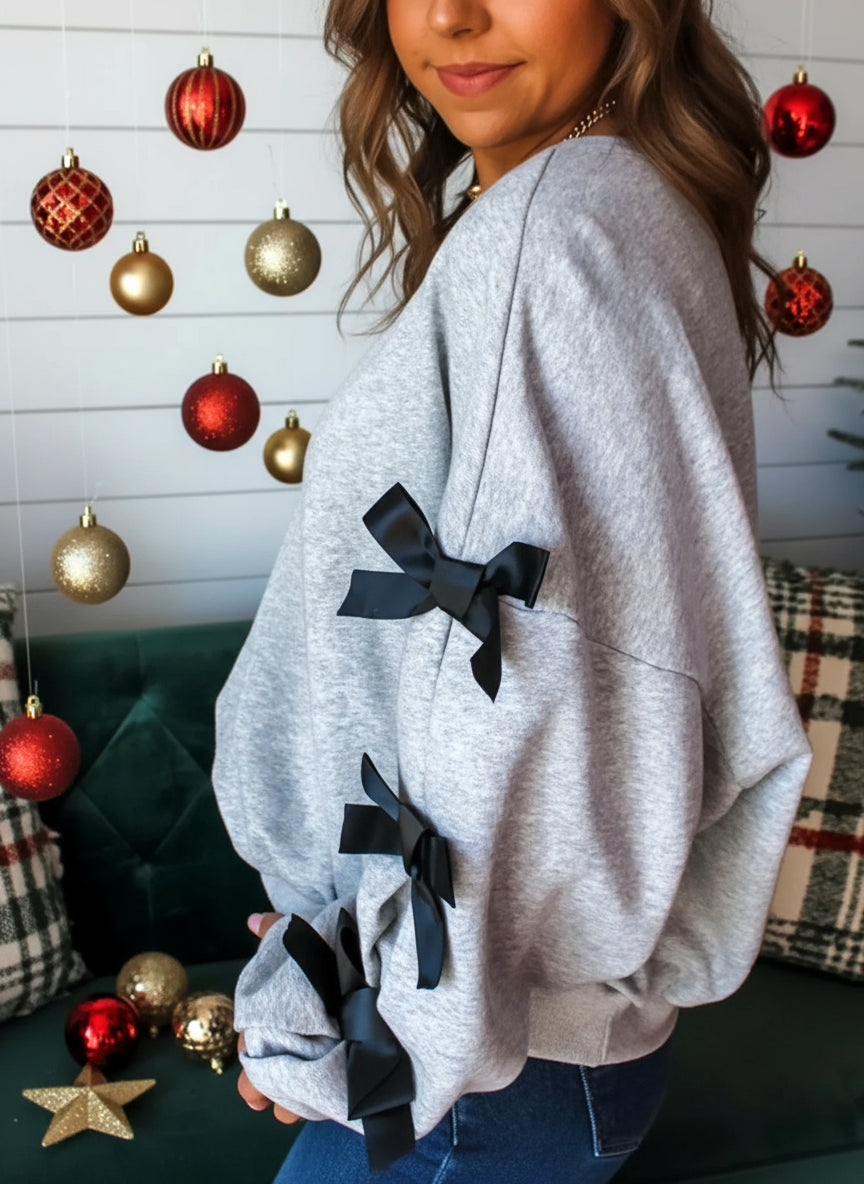 Christmas sweater with black bow