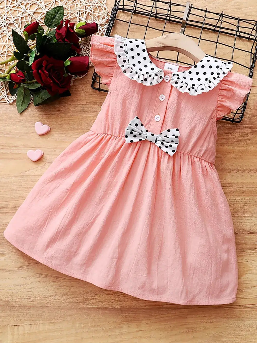 Children's Bow Peter Pan Collar Ruffle Sleeve Dress in coral with polka dot collar and bow, perfect for little girls.