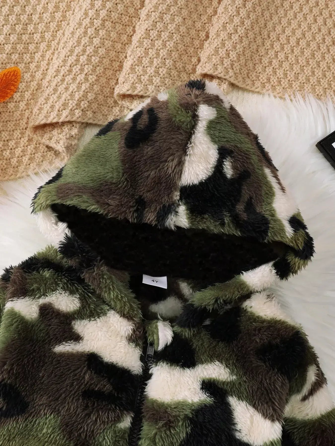 Children's Camouflage Plush Hooded Jacket showing the soft camo fabric and hood design.