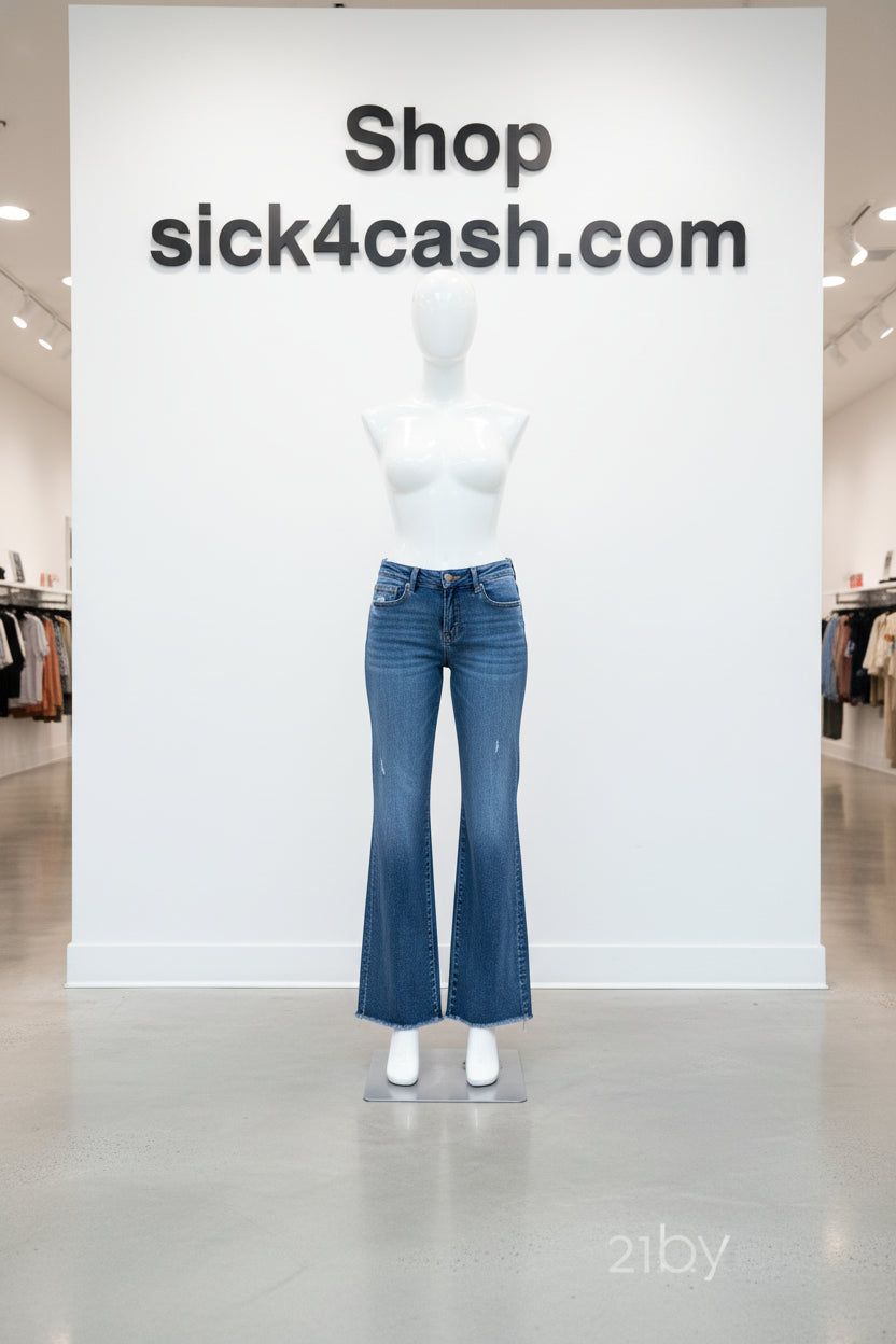 Blue jeans worn by a person on a white background