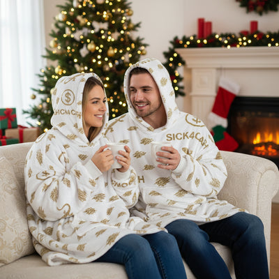 Baby outfit with gold text and patterns on a white background