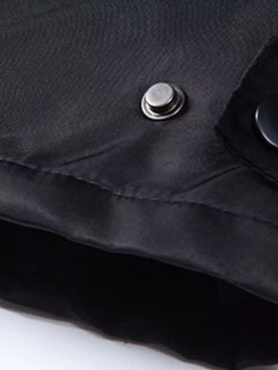 Men's Waterproof Windbreaker Hooded Tactical Jacket detail showing button and zipper fastening in black fabric.