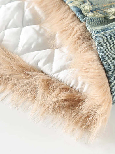 Close-up of a textured blanket with fur-like surface and white background