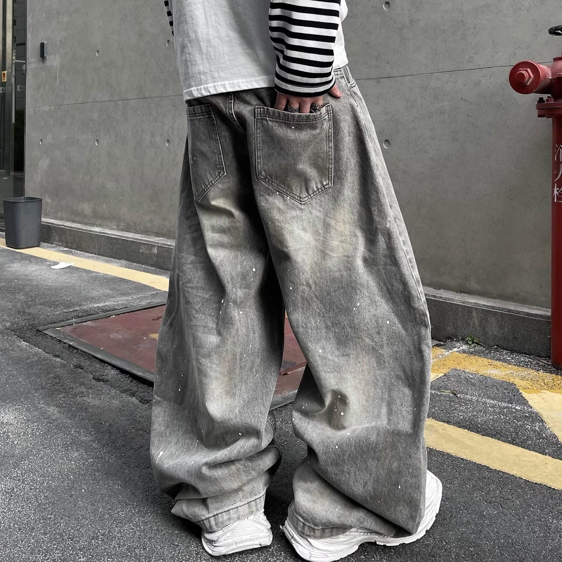 Ink-Washed Unisex Denim – Splash-Stained Jeans for Rebels & Creators