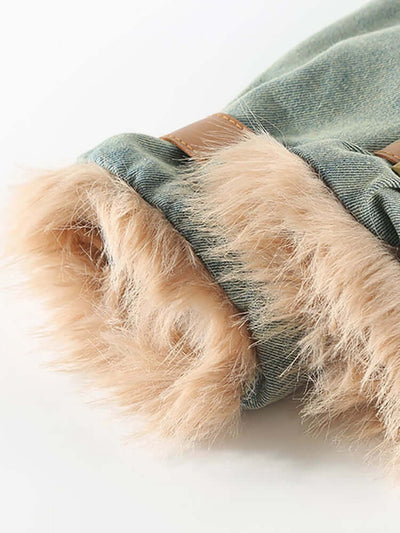 Close-up of a denim jacket with fur trim on a white background