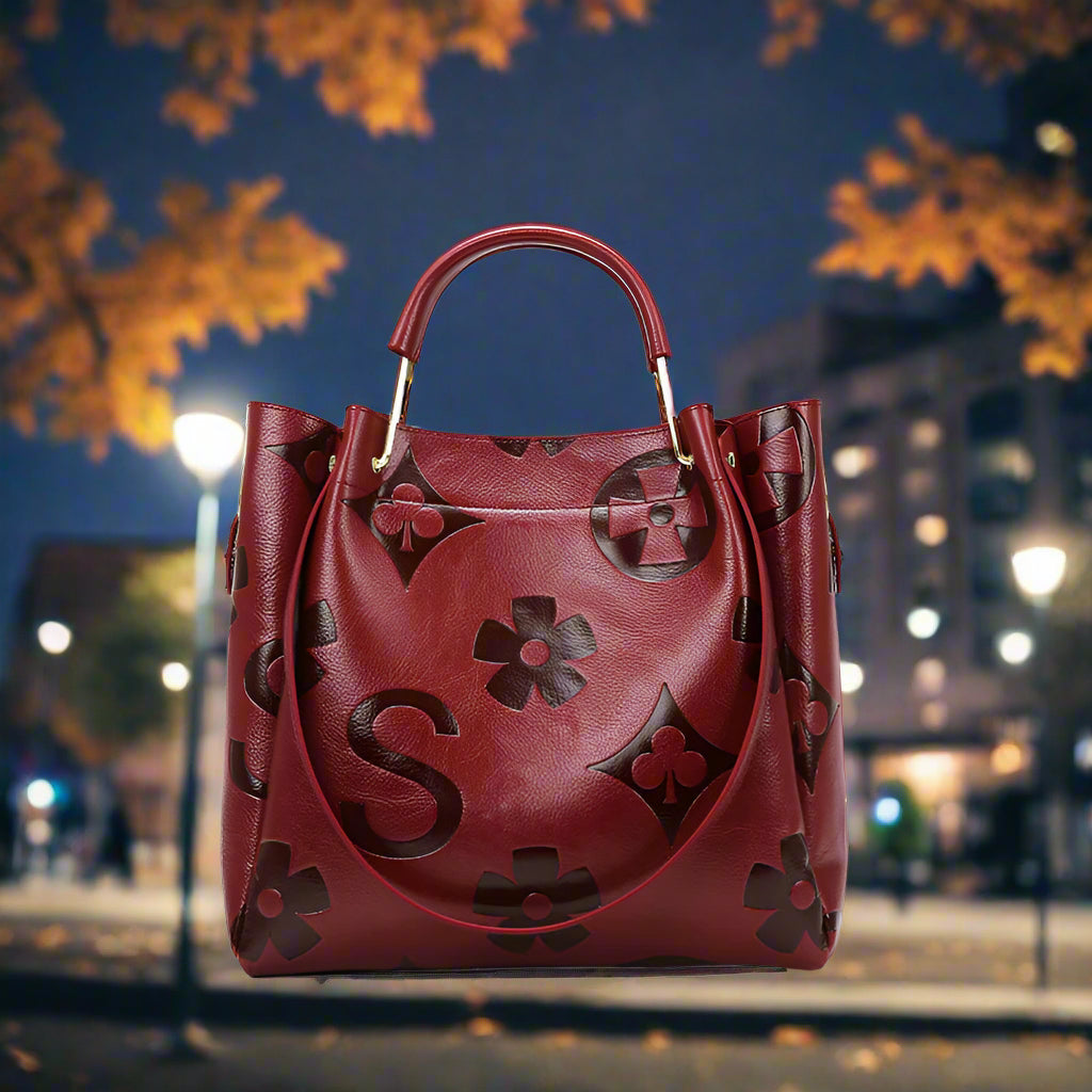Red handbag with floral fall color