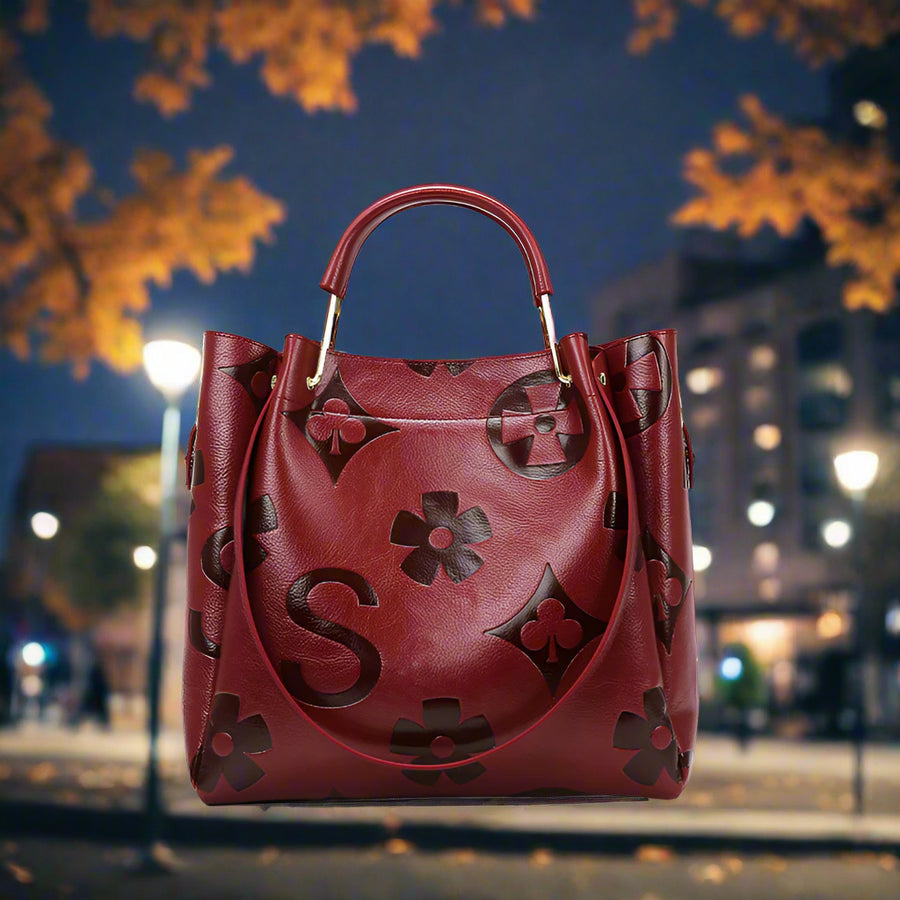 Red handbag with floral fall color