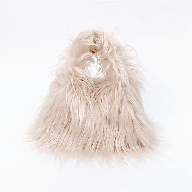 Twisted Faux Fur Shoulder Bag – Y2K Plush Chaos, Korean Streetcore Winter Tote Description:  Unleash the twisted twin of cozy. This faux fur shoulder bag isn’t soft—it’s savage. Born from the shadow grid of SICK4CASH®, this Y2K-