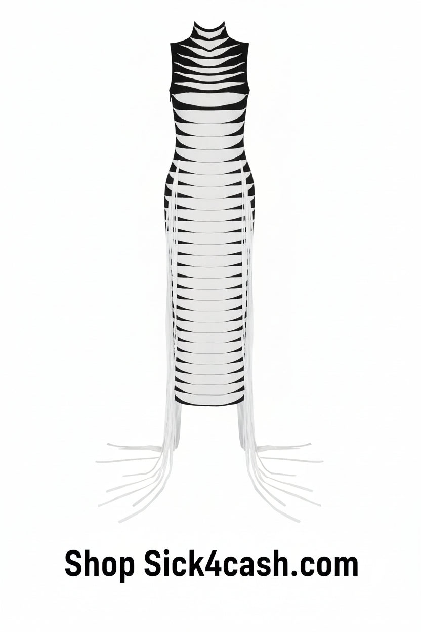 Black and white striped dress with fringe details on a white background