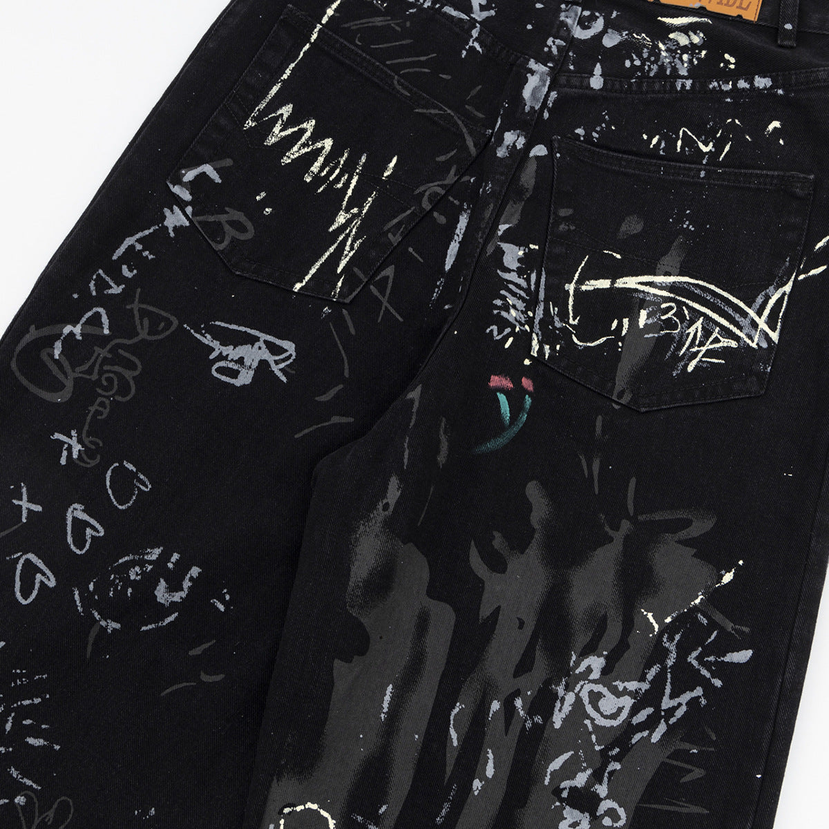 Men’s Graffiti Washed Denim Jeans – Streetwear with Attitude