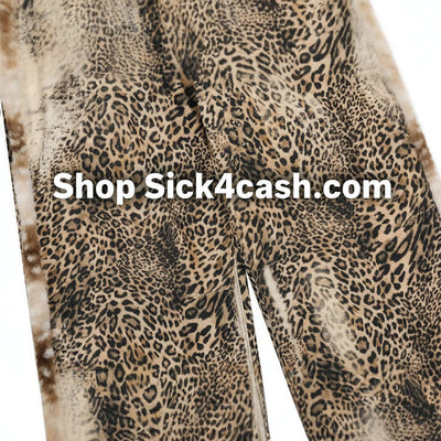 Street Style Men's Jeans with Leopard Print Patchwork, Casual Loose Fit Wide Leg Long Pants close-up showing leopard print details.