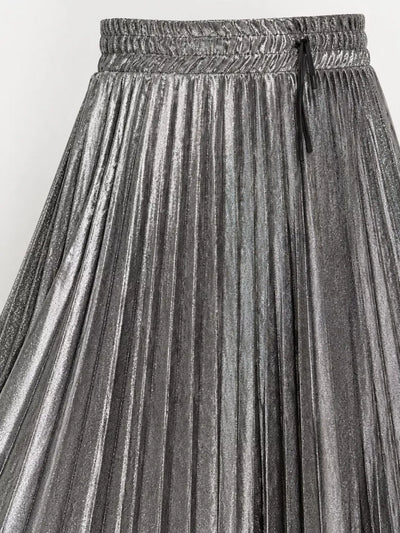 High-Waisted Metallic Pleated Maxi Skirt in Glamorous Silver with elastic waistband and pleated texture.