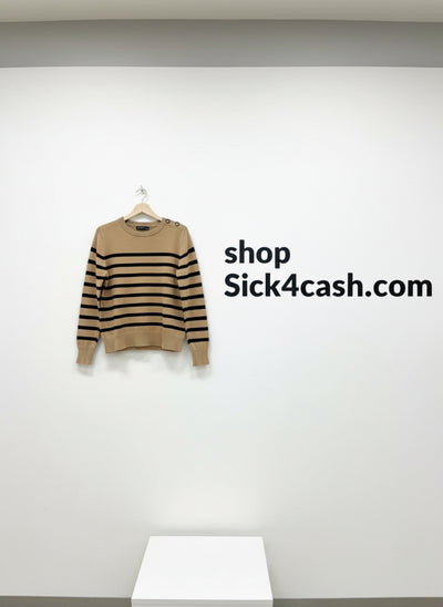 Woman  beige sweater with black stripes