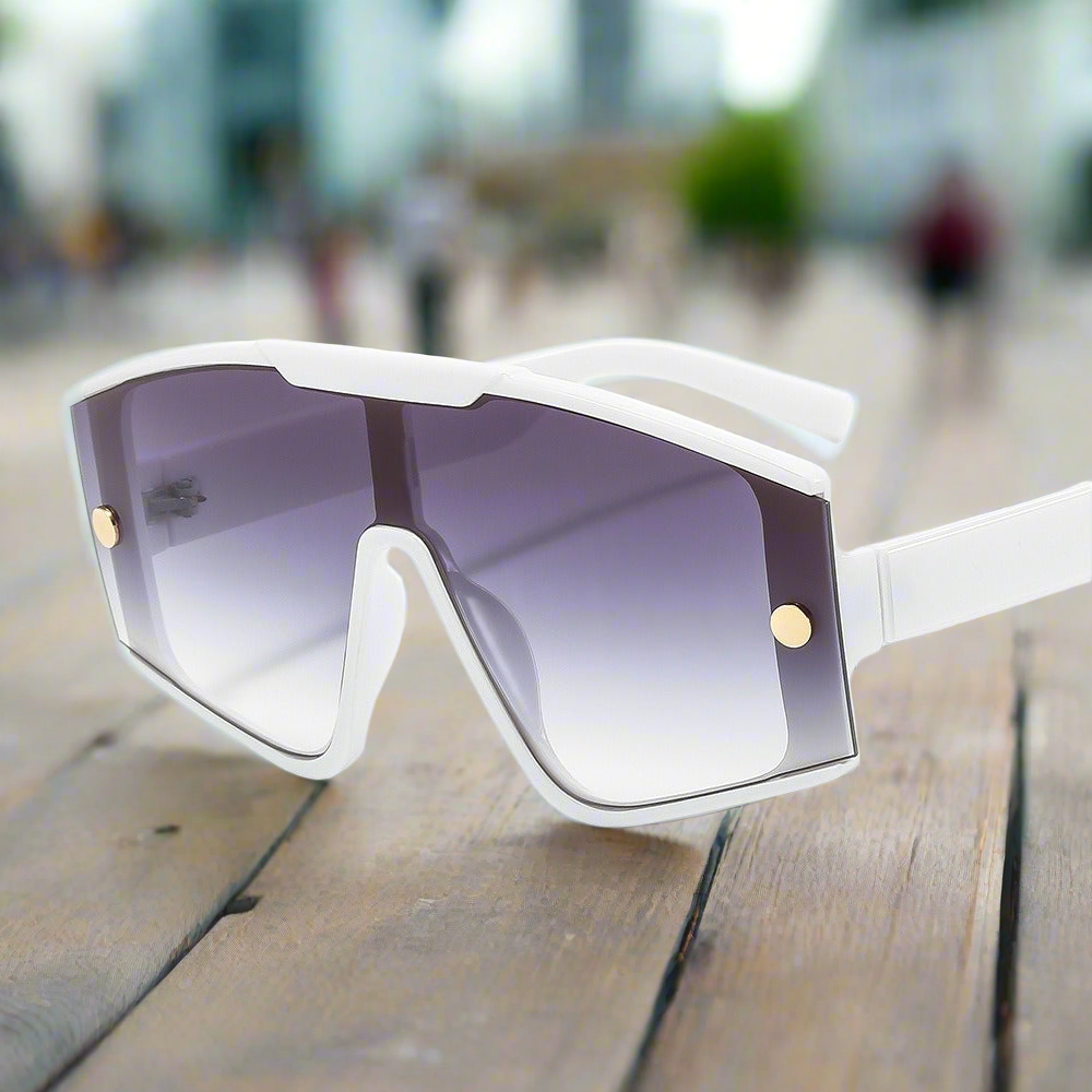 Sunglasses with a white frame and gradient lenses
