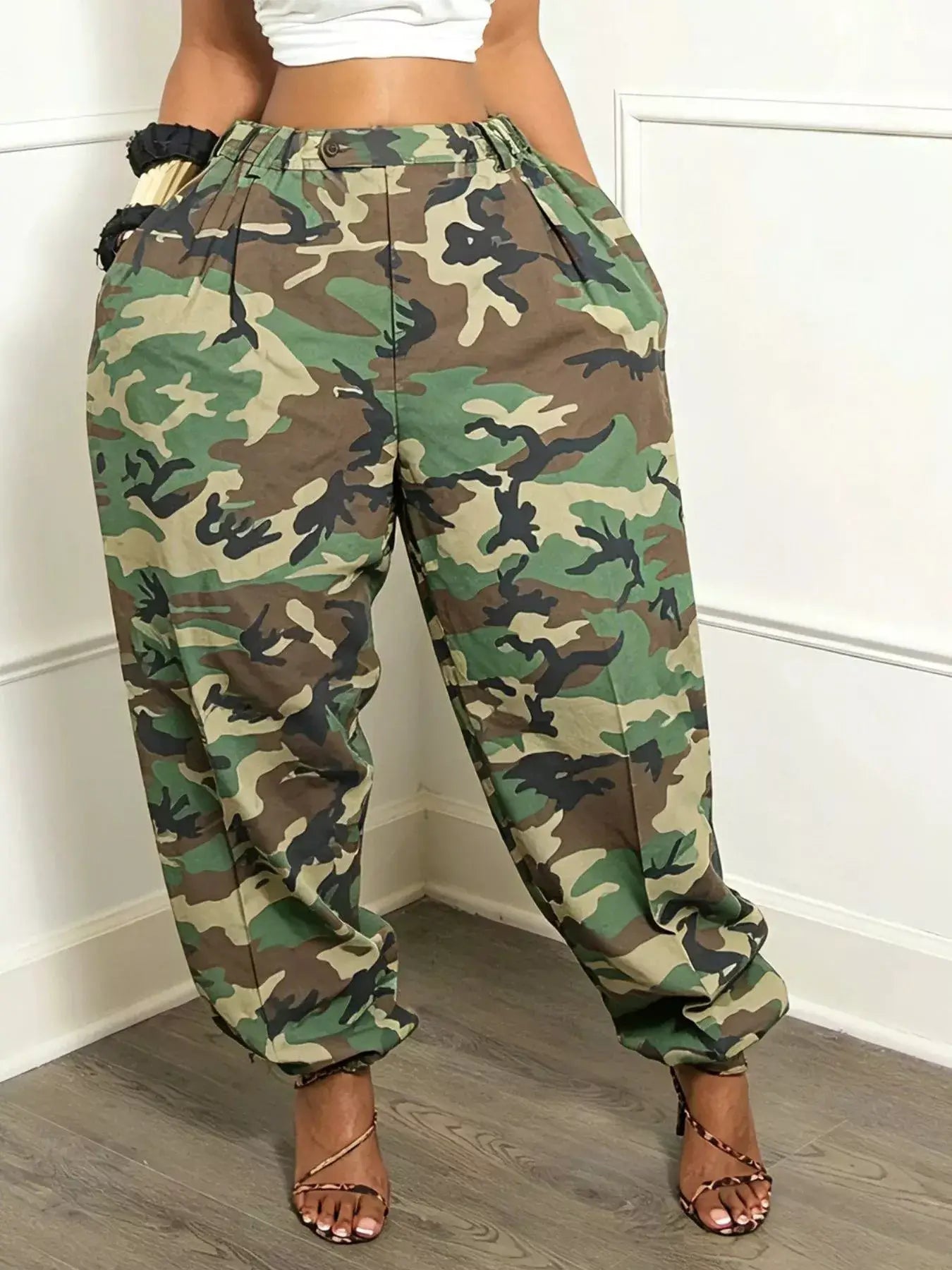 Camouflage Cargo Pants with Pockets displayed on a model, showcasing the drawstring and pocketed design.