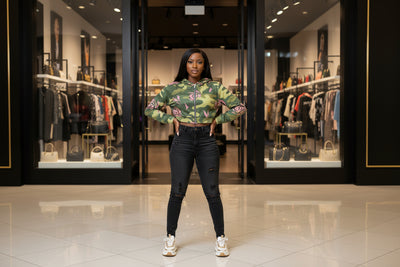 Green camouflage hoodie with pink roses on a white background