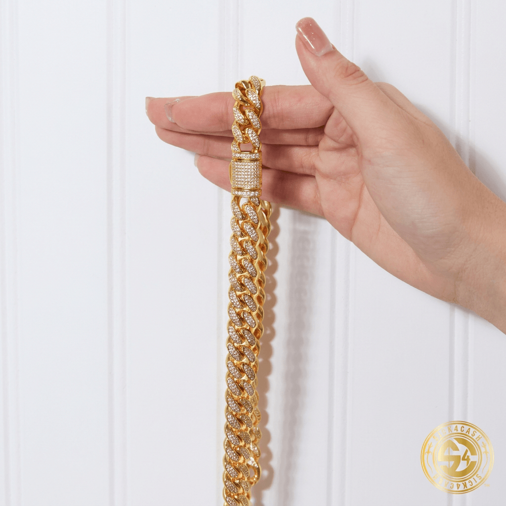 Hand holding necklace upright