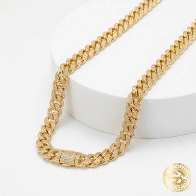 Necklace draped over white pedestal